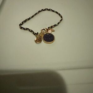 Elegant Gold and Black Charm Bracelet with an “A” initial